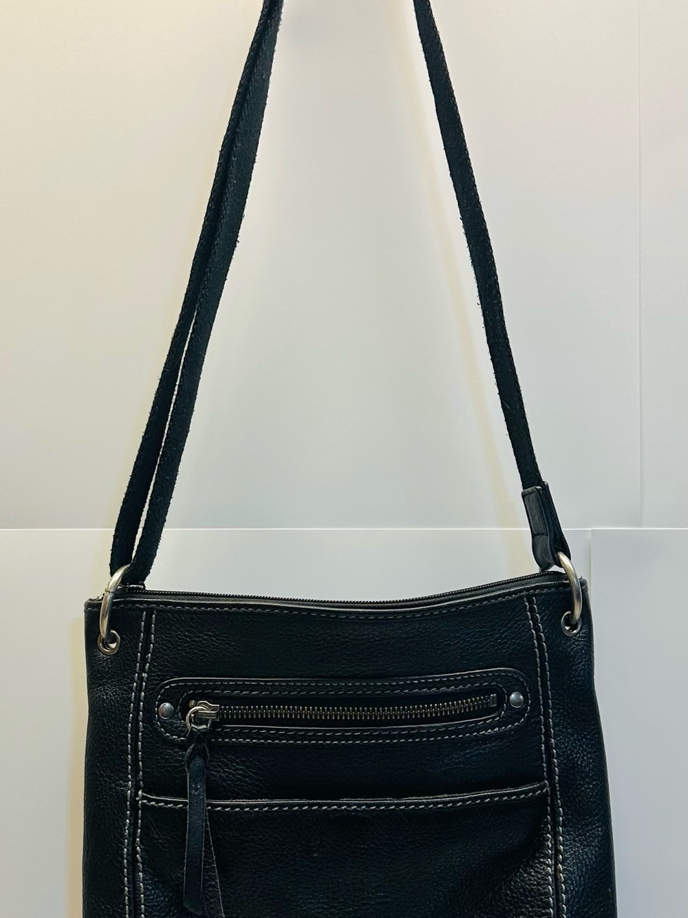 The Sak Black Leather Shoulder Bag with Front Zip Pocket